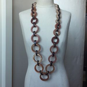 Chico’s long brown and tan lucite necklace